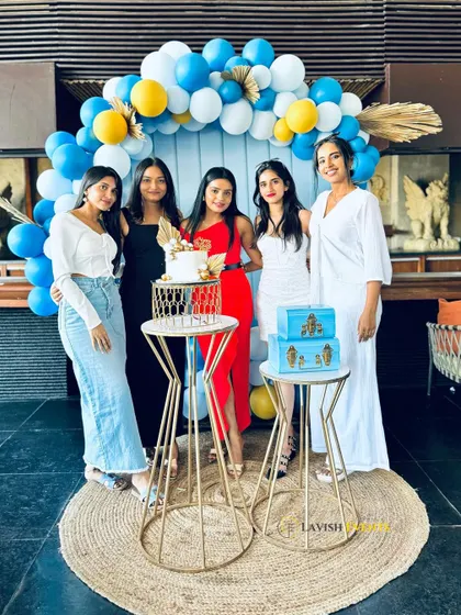 A group photo capturing the fun and stylish atmosphere of the party.