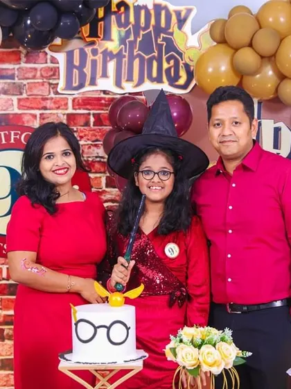 A magical 'Princess' themed birthday party, with elegant decor, shimmering backdrops, and royal props, making every little girl feel like royalty.