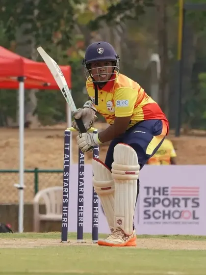 A batsman plays a defensive shot, demonstrating the temperament and technique needed for long innings.