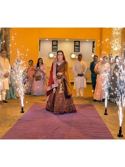 The bride's grand entrance, with sparklers creating a magical pathway.