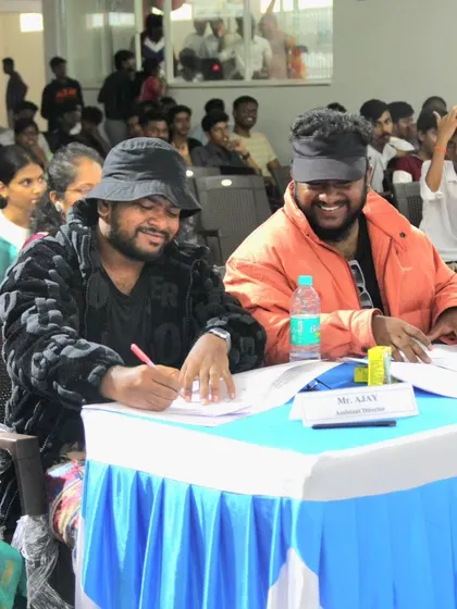 Sharing a lighter moment at the judge's table during a college event. While I take the scoring seriously, I also believe in creating a positive and encouraging atmosphere for the participants 💫
