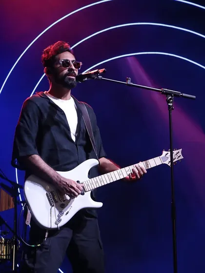 The guitarist of Sanam Band on stage, with our custom neon light design creating a dynamic and energetic concert atmosphere.
