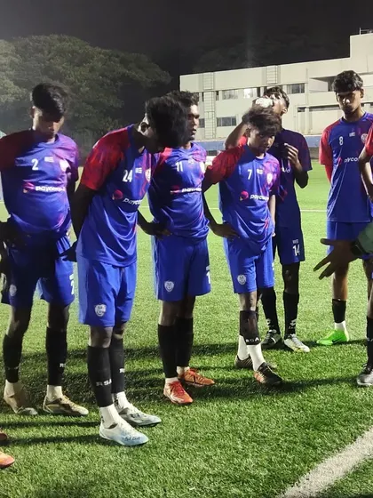 The team huddle before our dominant victory against JBS.