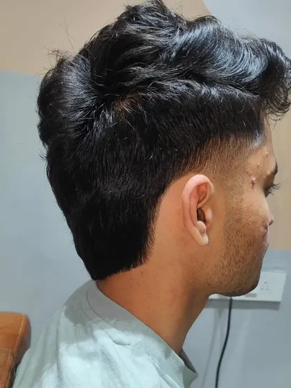 A close-up of the final result, showing the clean lines of the new haircut.