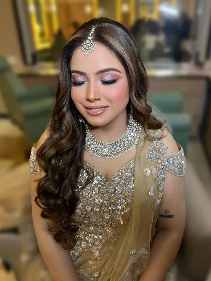 A close-up of the beautiful, shimmery eye makeup.