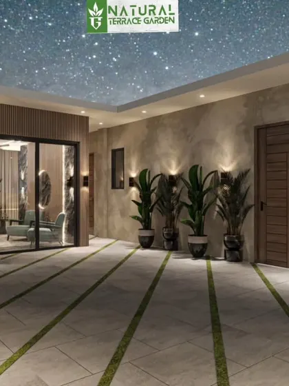 A spacious terrace concept with a covered ceiling and modern pendant lights. The design uses large format tiles and planters to create a clean, expansive feel.