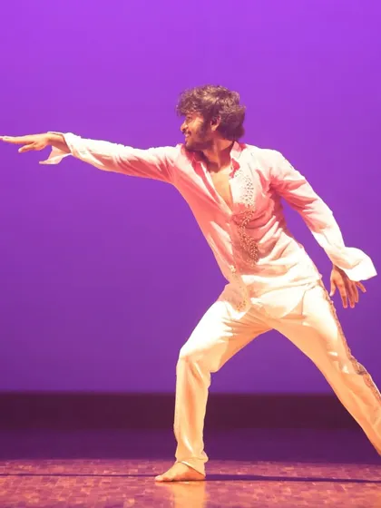 A strong, poised stance from a contemporary piece at our annual showcase. The performance highlights the blend of technical skill and artistic expression we teach.