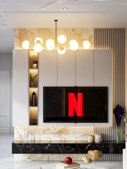 A 3D render of a TV wall with integrated shelving and a statement chandelier. The black marble base and white upper cabinets create a bold, high-contrast look.