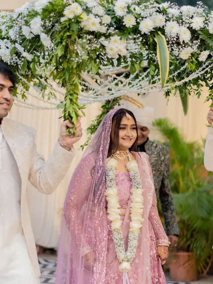 Her entrance as a bride. The soft, dewy makeup catches the light beautifully, making her glow as she walks down the aisle.