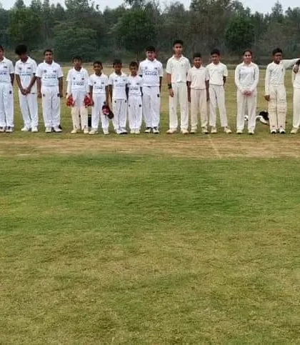 Both our team and the visiting Austasia Cricket Academy from Sri Lanka line up before the match.