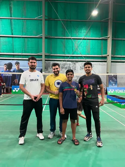 The coaching team with bronze medalist Shantvik Rao. It takes a team effort to build a champion.