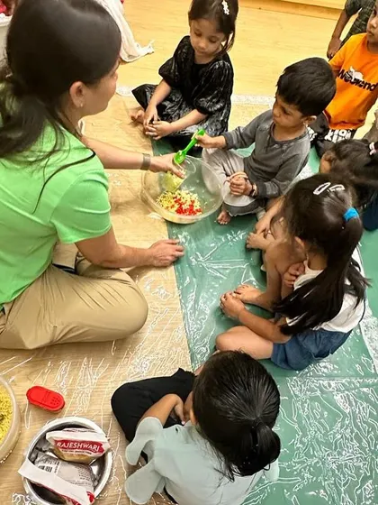 Each activity, from making Bhel Puri and toast to plucking methi leaves and exploring what floats, is a lesson in itself. These practical life and sensorial activities are central to the Montessori method, helping children develop fine motor skills, concentration, and a deep understanding of the world through their own actions.