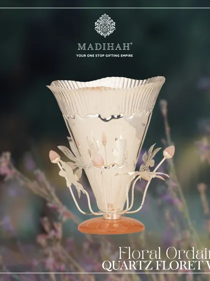 My Floral Ordained Quartz Floret Vase. Adorned with rose quartz and silver, this exquisite piece from the Silvered Collection embodies a harmonious blend of elegance and refinement, making it a perfect luxury gift.