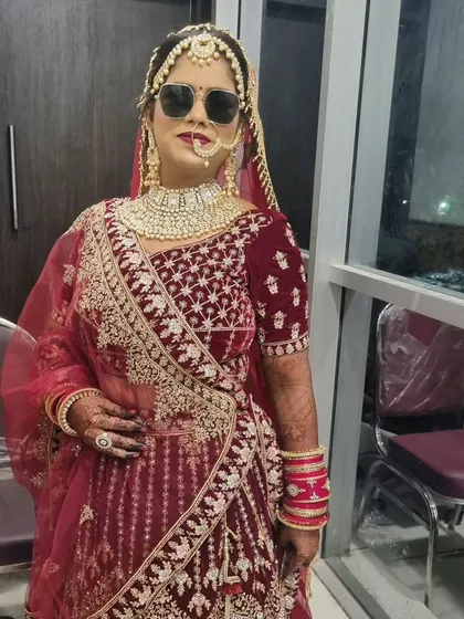 A fun and modern twist on a bridal photo. The sunglasses add a bit of swag to the traditional look, showing that you can have fun on your wedding day.
