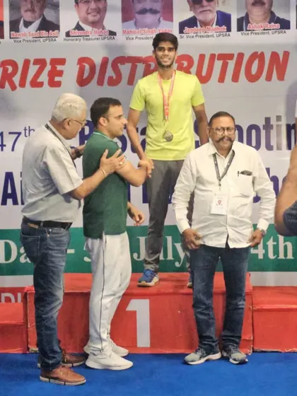 Sanskar Havelia on the podium after his gold medal win at the UP State Shooting Championships.