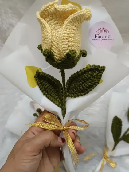 The yellow rose bouquet I made for Teacher's Day. It was my first time trying to make a floral bouquet, even if it was just for one rose.