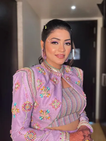 Krisha looks ready for a carnival party in this creative and colorful look.