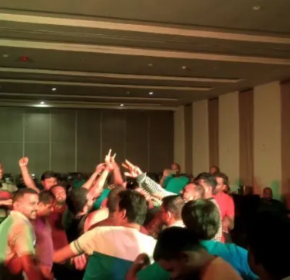 A moment of celebration on the dance floor.
