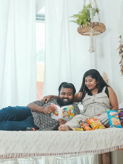 This fun-loving couple chose a casual, playful theme with snacks, showing a different and very real side of the pregnancy journey.