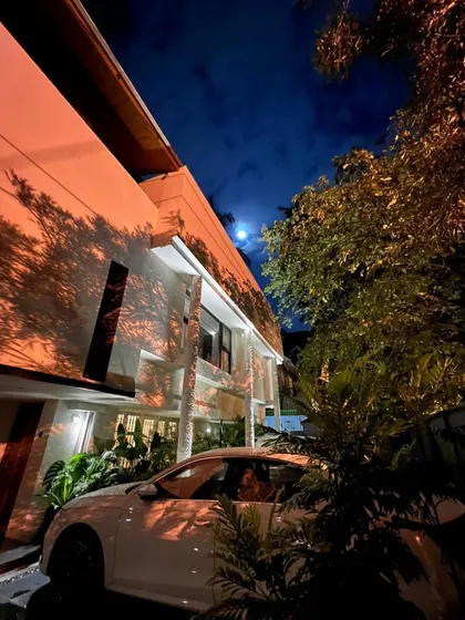 A beautiful moonlit evening at one of our renovated homes. We love how the architectural lighting and natural moonlight play with the shadows and textures of the facade, creating a dramatic and inviting atmosphere.