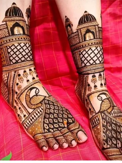 A classic foot mehendi design featuring peacocks and architectural domes, perfectly symmetrical on both feet.