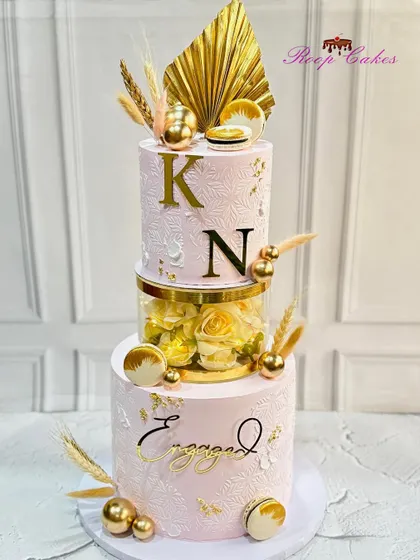 Sweet beginnings and endless love. This is another version of my most-loved engagement cake design, featuring a floral separator and personalized with the couple's initials.