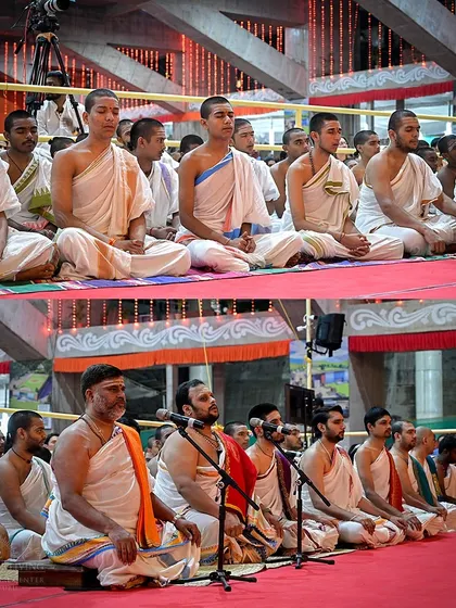 Vedic pundits and students sit in meditation during the first day's puja of Navratri. Their discipline and training are the backbone of our authentic Vedic ceremonies.