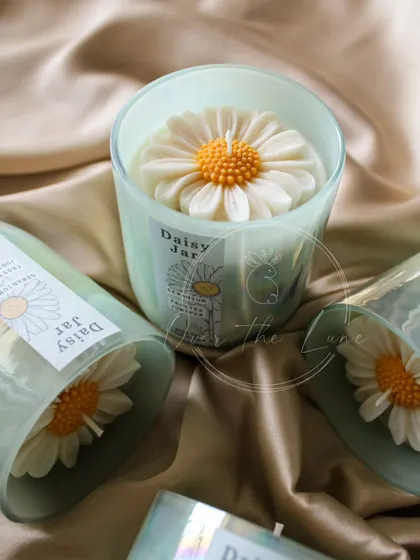 A close-up of the iridescent Daisy jar candle. The way the light catches the glass is just beautiful.