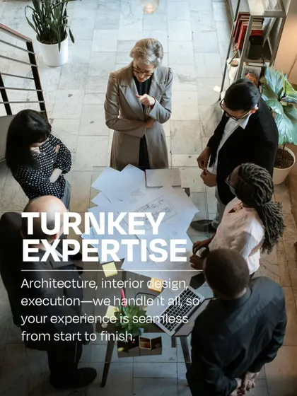 A team reviewing blueprints, symbolizing our turnkey expertise. We handle everything from architecture and interior design to execution, providing a seamless and hassle-free experience from start to finish.