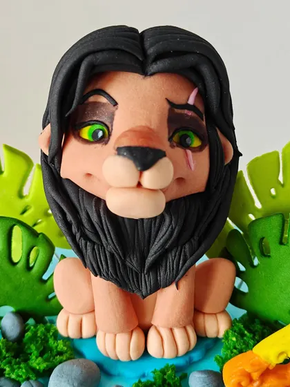 A close-up of the fondant Scar topper from the Lion King cake. I focused on capturing his menacing yet iconic expression to make him the star of this villain-themed masterpiece.