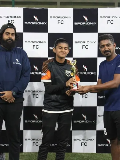 Presenting the trophy to a deserving winner of a corporate football match. We manage all award ceremony logistics, including trophies and backdrops.
