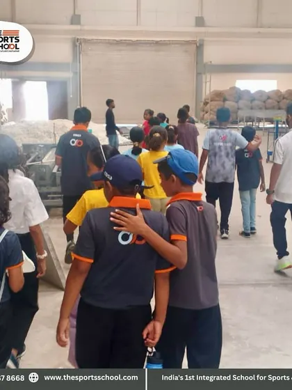 Students walk through the silk factory, observing the process from raw material to finished product.