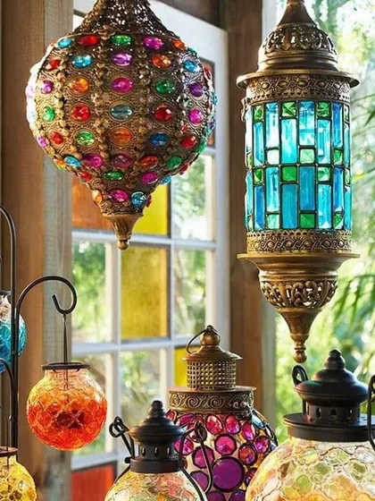 The rich, jewel-toned colours of Moroccan lanterns can be the starting point for an entire room's palette, creating a warm, eclectic, and inviting atmosphere.