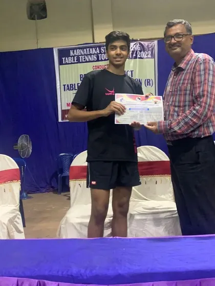Samyak K receiving his certificate for reaching the U19 Semifinals at the Bellary tournament.