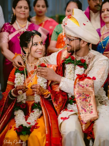 A sweet, candid moment between the bride and groom during their wedding ceremony.