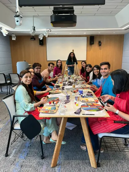 A group of happy participants at the Google workshop, all deeply focused on their artwork. It's rewarding to see teams connect and create together outside of their usual work roles.