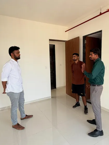 Discussing the layout and possibilities for a new apartment with the clients.