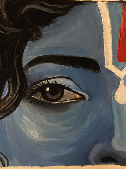 An extreme close-up on the eye in the Krishna painting, showing the detail in each brushstroke.