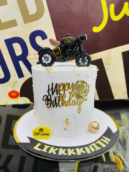 A stylish 3kg cake for a bike lover, featuring a detailed topper of a Jawa motorcycle.