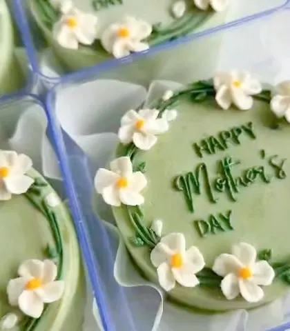 A macro shot of the delicate flower details on our Mother's Day bento cakes.