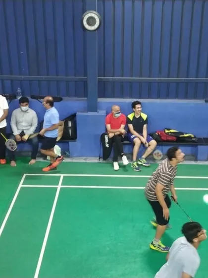 Action on the court while others watch from the sidelines. Our facility includes hangout zones, making it a great social spot for players and their friends to relax between matches.