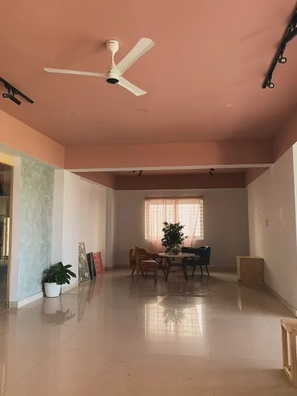The sitting area is a quiet spot for reflection or sketching out new ideas. We've found that having a comfortable space away from the wheel is essential for the creative process.