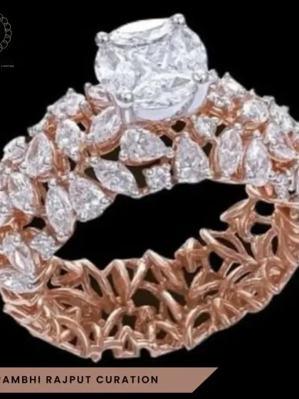 Craftsmanship is at the heart of my work. This intricate ring, with its floral-inspired lattice of rose gold and a brilliant solitaire surrounded by marquise diamonds, is a showcase of detailed artistry and premium design.