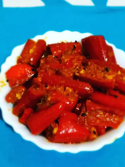 A serving of my Red Chilli Pickle in a small bowl. This shows the perfect portion to add a spicy kick to your meal.