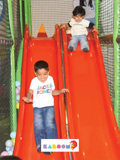 Weee! The joy of going down the slide is a timeless childhood pleasure, and our bright red slides are a huge hit.