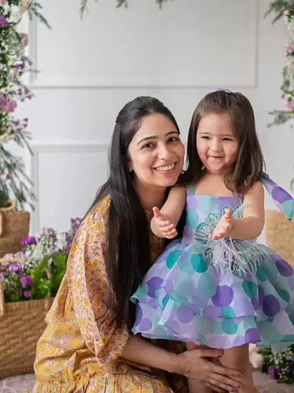 Capturing the loving connection between mother and child. This shot highlights their happy interaction, making it an ideal image for a family-oriented brand campaign or a Mother's Day feature.