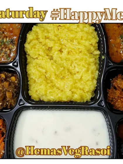 A comforting plate of Kadi Khichdi served with matki gravy, muli sabji, a tangy kairi carrot salad, and crispy corn pakodas.