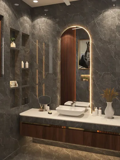 This powder washroom in Lajpat Nagar combines dark marble walls with rich wood accents to exude luxury and warmth.