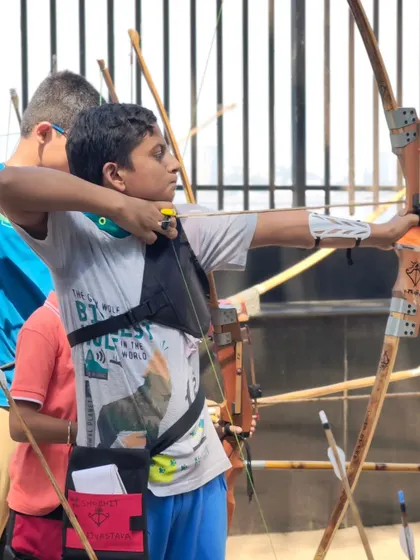 A young boy at full draw, showing great potential. Our trials are a platform for such talent to shine.
