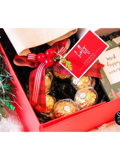 A festive Ferrero Rocher wreath, a sweet detail in our 'Holiday Home' Christmas hamper.